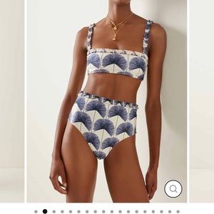 Two piece suit & wrap from SwimShe.  Brand new